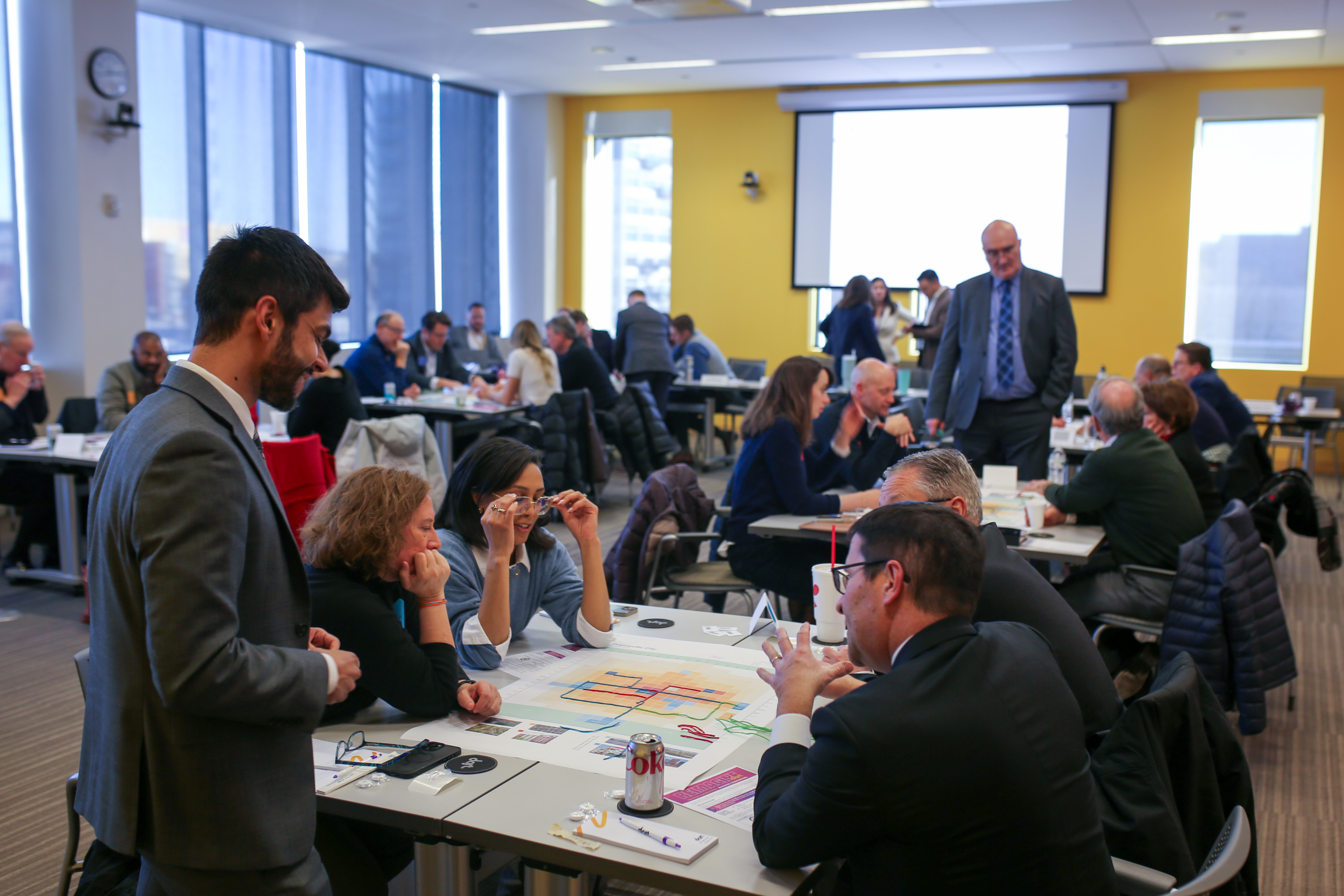Image of DART staff and stakeholders working with consultants