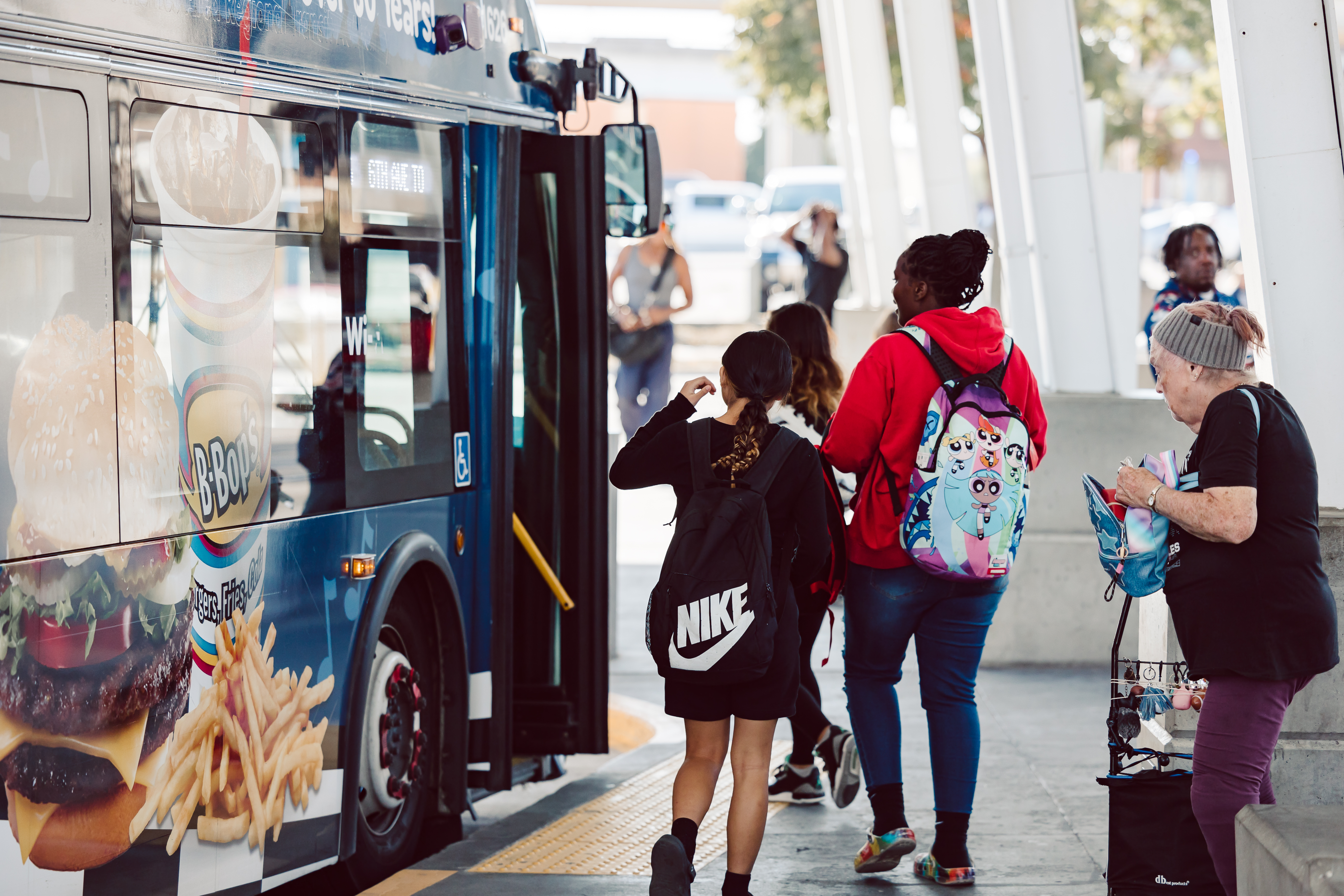 Passengers boarding a DART bus